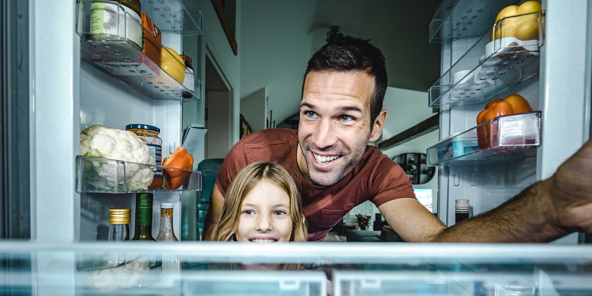 Looking in fridge