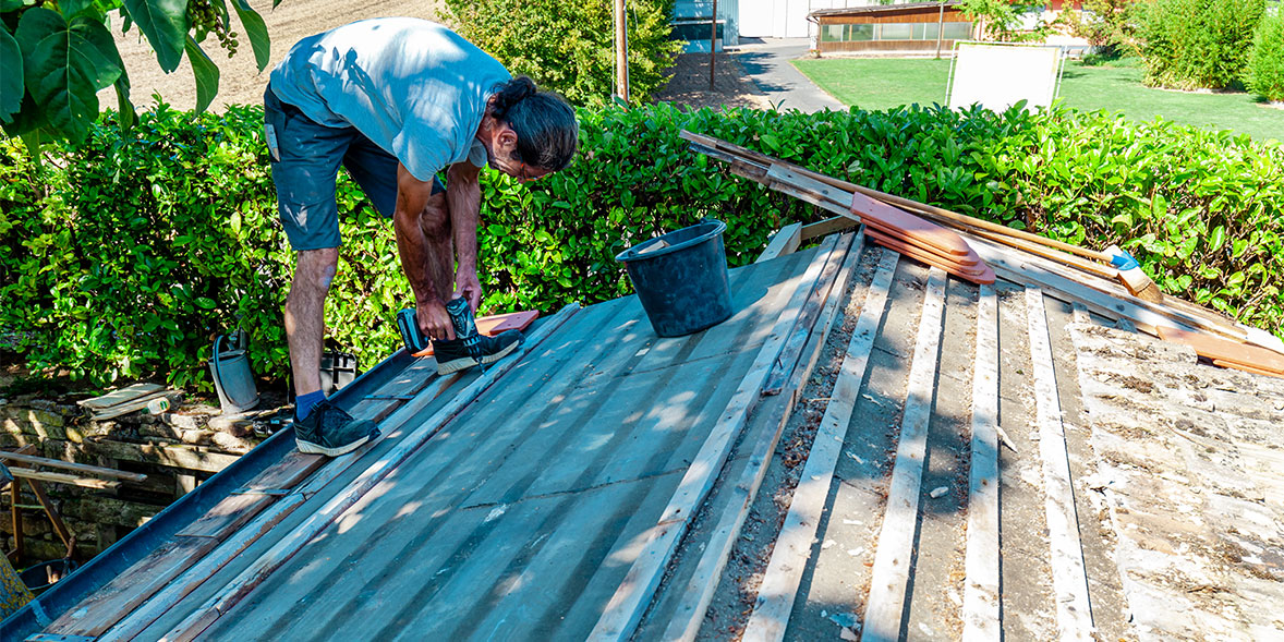 Builder replacing a roof