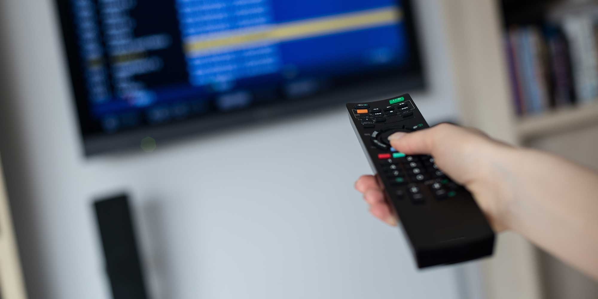 User adjusting picture settings on their TV