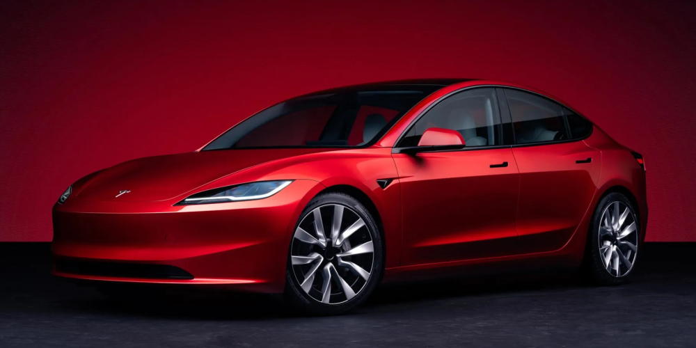 Tesla Model 3 electric car on red and black background